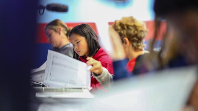 Students learning together to achieve the mission